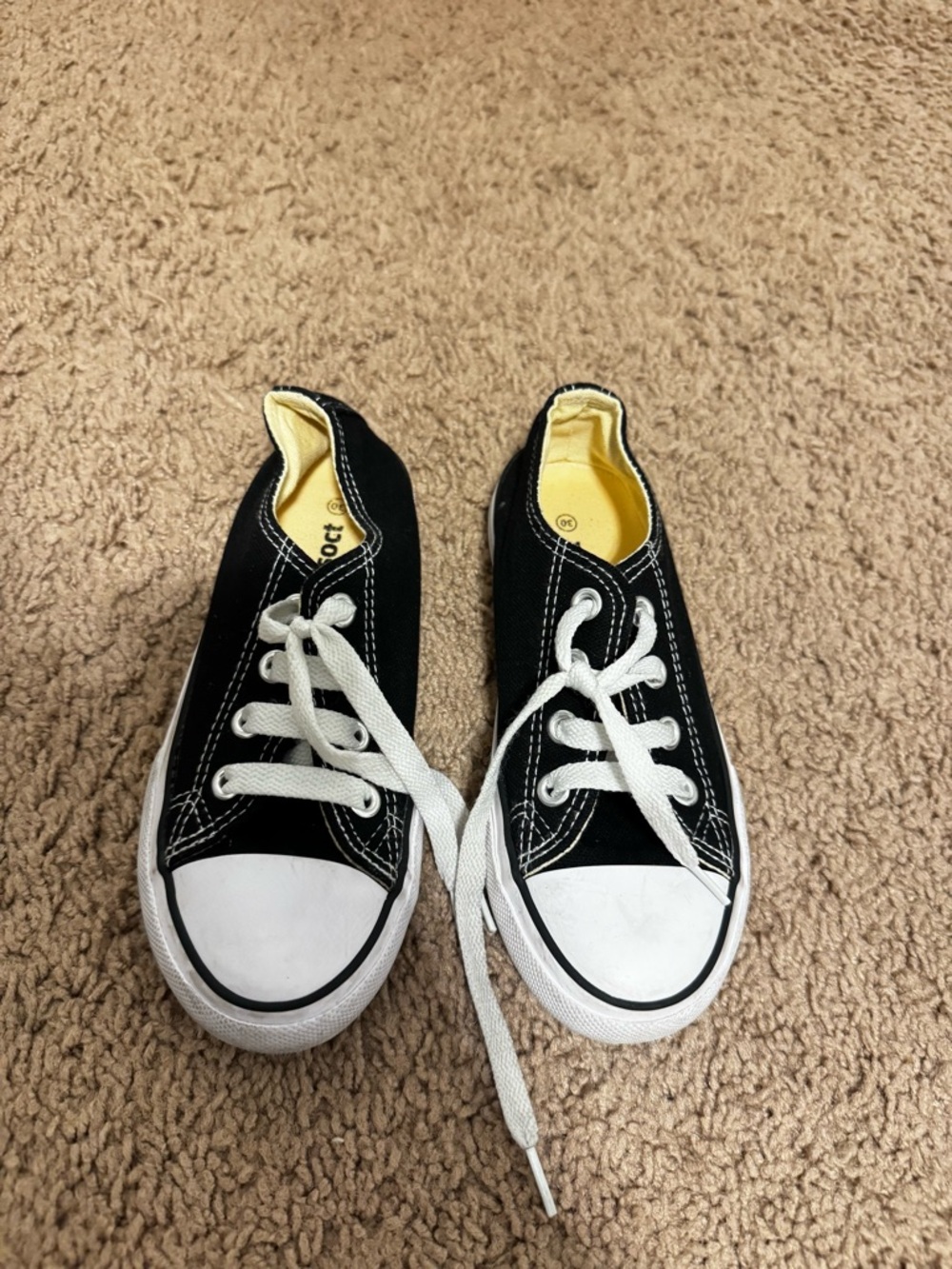 Kids Low-Top Black Canvas Sneakers with White Toe and Yellow Lining